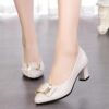 Womens black pointed toe pumps with sparkling accents mid heel synthetic leather