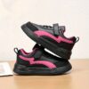 Adorable girls black and pink Twinkle Toes EVA sneakers perfect for autumn and winter Featuring a durable sole and stylish design