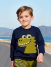Stylish boys dinosaur print sweatshirt and pants set perfect for active play Features a vibrant dinosaur print on a comfortable versatile outfit suitable for school playtime and everyday wear Ages 4 7