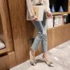 Golden stiletto heels with elegant bow featuring a comfortable insole and slip resistant sole perfect for weddings and events