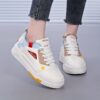 Newness Urban Chic Color Block Sneakers Trendy color blocked sneakers effortlessly cool and chic for everyday style
