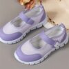 Pastel purple and white Twinkle Toes Girls Magical Closure Sneakers showcasing their comfortable design and easy onoff feature Ideal for school play or dance