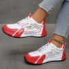Newness City Chic Striped Athletic Sneakers Stylish striped sneakers perfect for everyday wear Close up view showcasing the chic design and comfortable athletic build