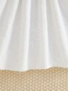 Newness Kensington Jacquard Floral Dress A chic and elegant floral dress perfect for spring Close up view showing the intricate jacquard fabric and flattering silhouette