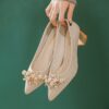Newness Celestial Sparkle Floral Rhinestone Pumps Elevate your style with these dazzling floral rhinestone pumps perfect for weddings and special occasions Close up showcasing intricate floral detail and sparkling rhinestones