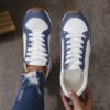 Stylish and comfortable Newness Cityscape Casual Fabric Sneakers perfect for everyday wear in any season The image shows the sneakers from an angle showcasing the fabric texture and design details