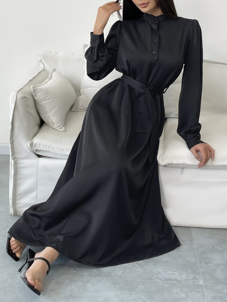Effortlessly elegant black A-line dress from Newness, perfect for any occasion.