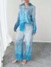 Stylish womens Dubai Nights Printed Pants Set from Newness Flattering wide leg pants and a coordinating top in a vibrant Middle Eastern inspired print Perfect for evening events or a chic daytime look
