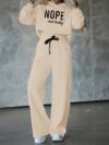The Newness Effortless Chic Letter Print Lounge Set A stylish and comfortable two piece loungewear set featuring a relaxed modern silhouette and a chic letter print