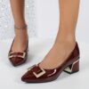 Womens black Mary Jane heels with gold buckle straps and chunky mid heel