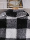 Stylish woman wearing a comfortable and chic plaid dress set ideal for autumn outings