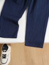 Stylish boys two piece outfit in a trendy striped pattern featuring a comfortable stand collar shirt and cuffed pants perfect for spring or autumn