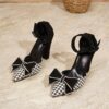 Chic black and white houndstooth plaid bow pumps Mary Jane style pointed toe comfortable block heel Dubai design
