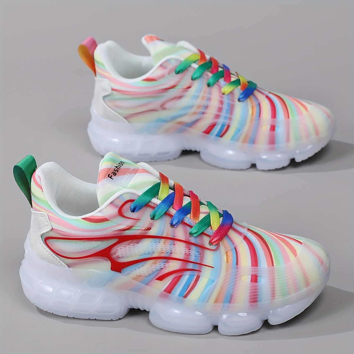 Newness Prism Rainbow Stripe Sneakers A vibrant pair of rainbow striped sneakers showcasing breathable comfort and stylish design perfect for all day wear