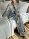 Effortlessly chic Riviera Romance floral print two piece set featuring a long sleeve shirt and wide leg pants perfect for all seasons