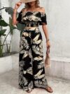 Escape to Paradise Model wearing the Newness Tropical Print Set showcasing its effortless chic style Perfect for summer days and nights