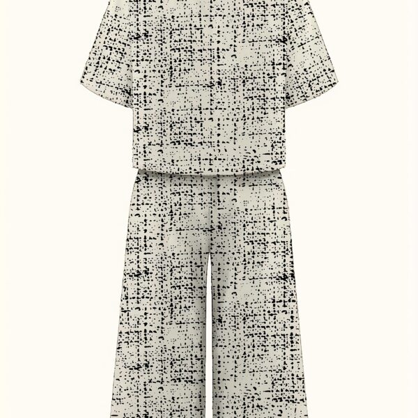 Model wearing the Newness Dubai Nights Geometric Print Set a two piece outfit with a striking geometric pattern