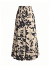 The Newness Cairo Floral Midi Skirt Set A chic and modern floral midi skirt and top set perfect for any occasion