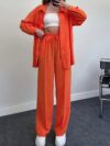 Model wearing a vibrant wide leg pants set perfect for spring The set features a flowy comfortable fit in a breathable polyester fabric