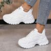 White womens chunky sneakers with geometric embroidery thick sole and lace up closure