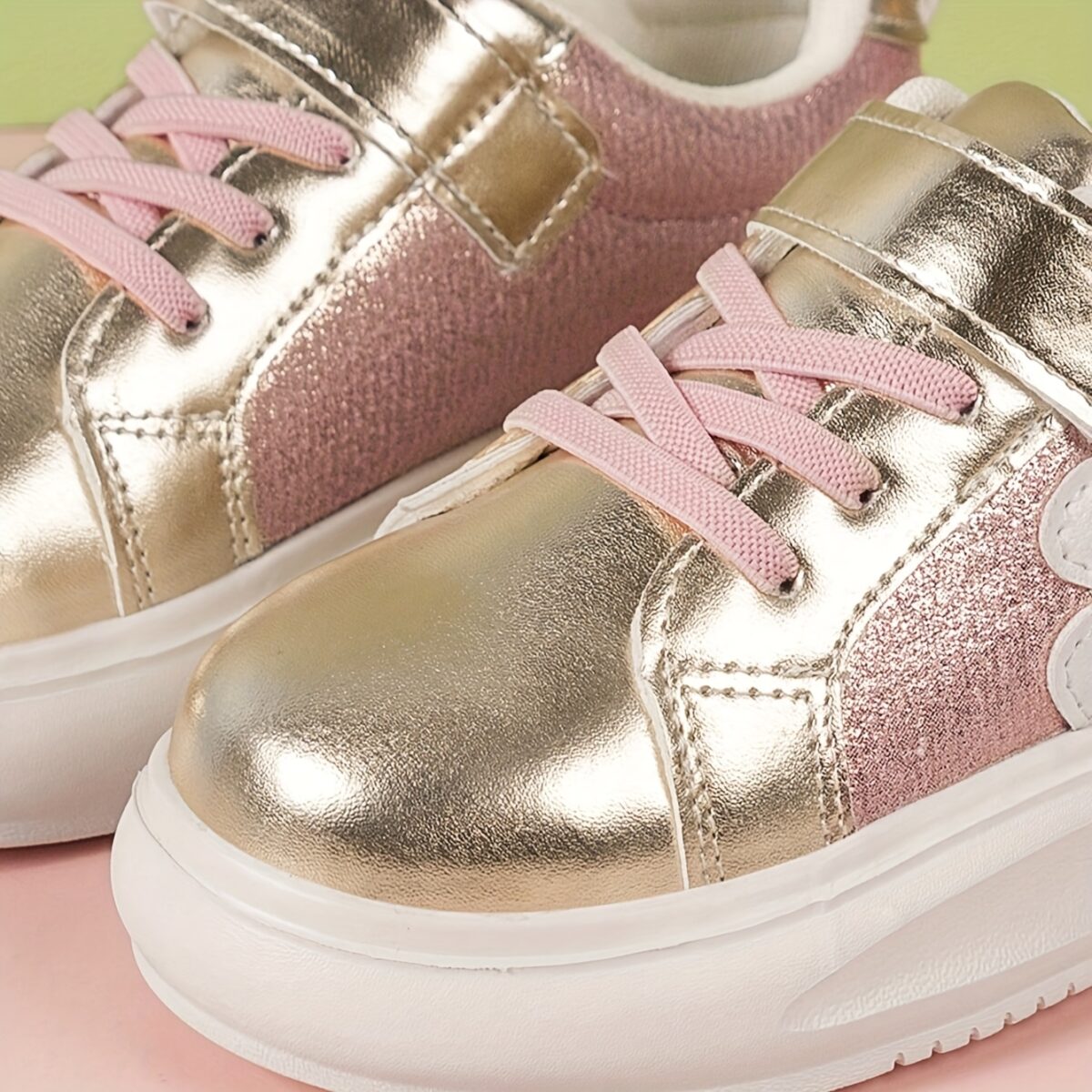 Adorable girls pink and white floral sneakers perfect for play or everyday wear Twinkle Toes brand