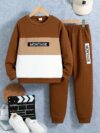 Stylish boys two piece outfit featuring a comfortable long sleeved knit pullover and trendy cargo pants perfect for spring and fall adventures