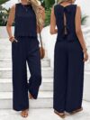 The Newness Riviera Navy Two Piece Set A stylish and comfortable navy blue two piece outfit perfect for spring and summer The image shows a model wearing the complete set