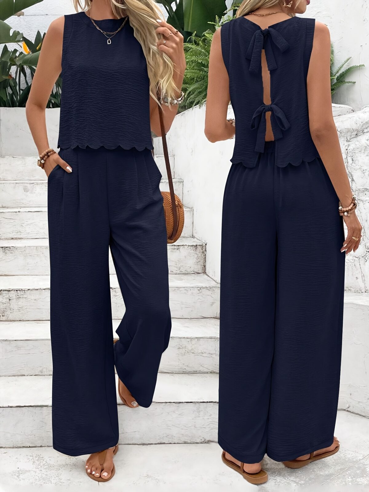 The Newness Riviera Navy Two Piece Set A stylish and comfortable navy blue two piece outfit perfect for spring and summer The image shows a model wearing the complete set