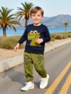 Stylish boys dinosaur print sweatshirt and pants set perfect for active play Features a vibrant dinosaur print on a comfortable versatile outfit suitable for school playtime and everyday wear Ages 4 7