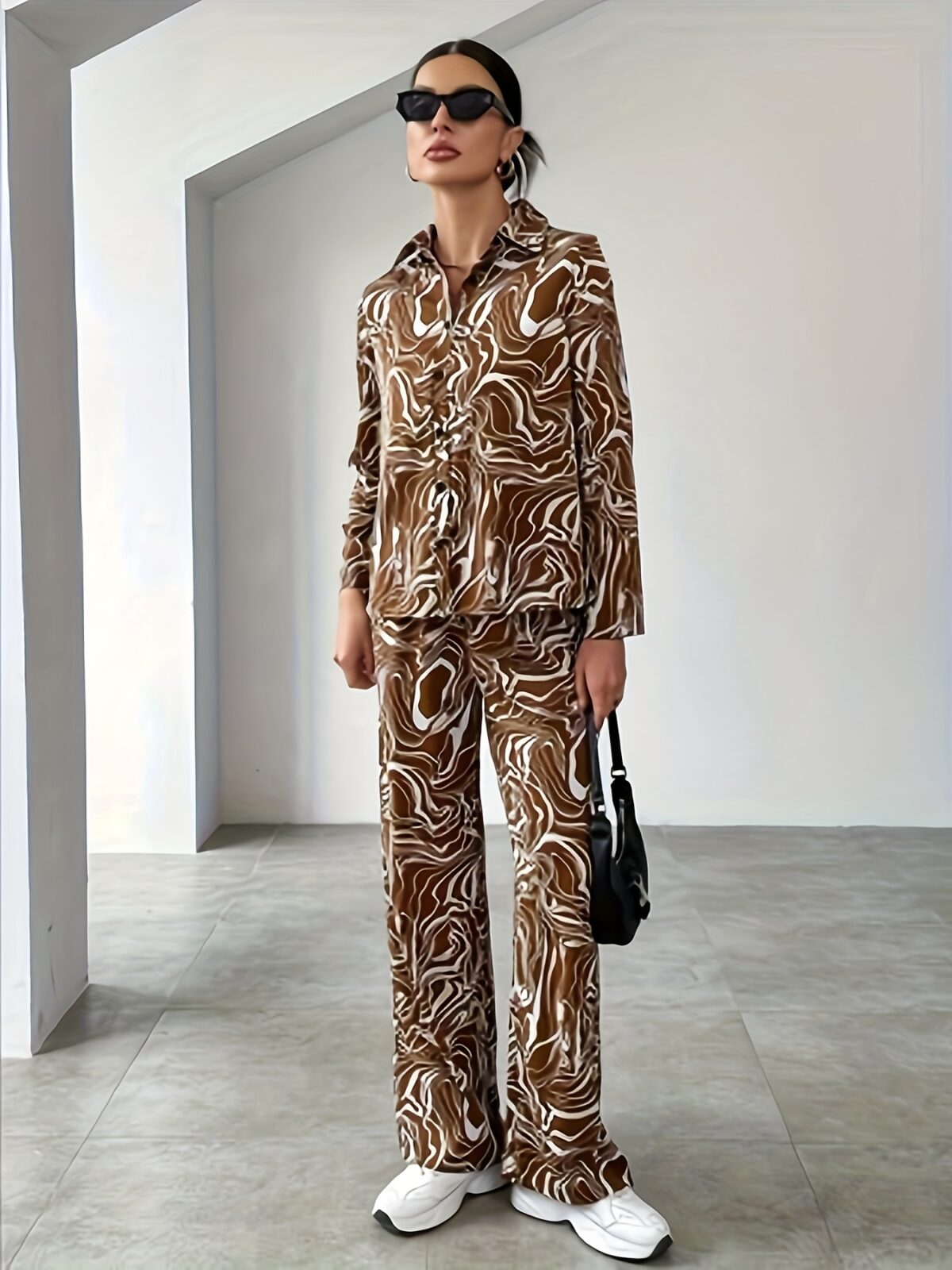The Newness Cairo Geometric Print Suit A chic and modern suit perfect for spring featuring a striking geometric print