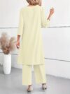 Effortlessly chic woman wearing the Jing Fei solid color pants set a luxurious polyester blend perfect for springsummer The model showcases the comfortable and stylish design