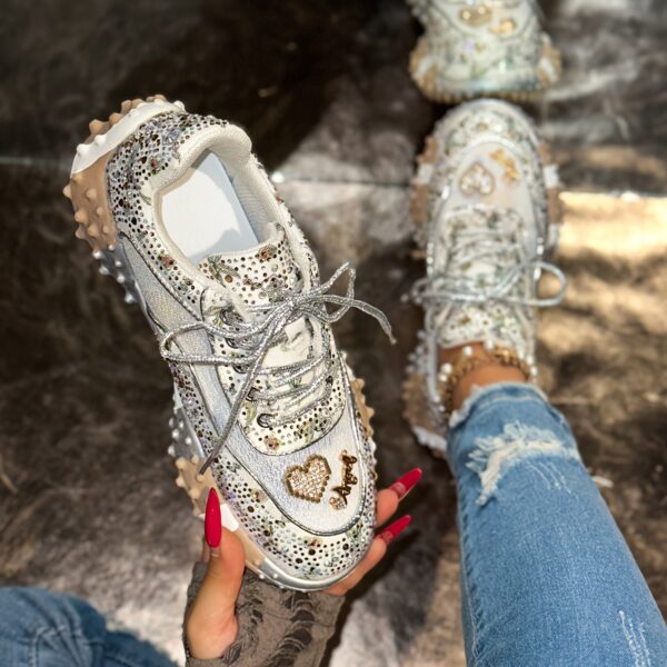 Newness Nova Sparkle Rhinestone Platform Sneakers: Elevate your style with these chic, durable platform sneakers featuring dazzling rhinestones. Perfect for any occasion.