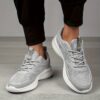 A pair of Newness womens casual walking shoes in a solid color showcasing their lightweight and comfortable design