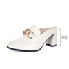 Black square toe pumps with a delicate chain detail and a comfortable block heel Newness Timeless Chic collection