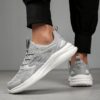 A pair of Newness womens casual walking shoes in a solid color showcasing their lightweight and comfortable design