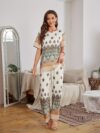 The Newness Riviera Rendezvous Geometric Print Set A stylish two piece outfit featuring a vibrant geometric print perfect for summer occasions Model showcases effortless chic