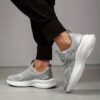 A pair of Newness womens casual walking shoes in a solid color showcasing their lightweight and comfortable design
