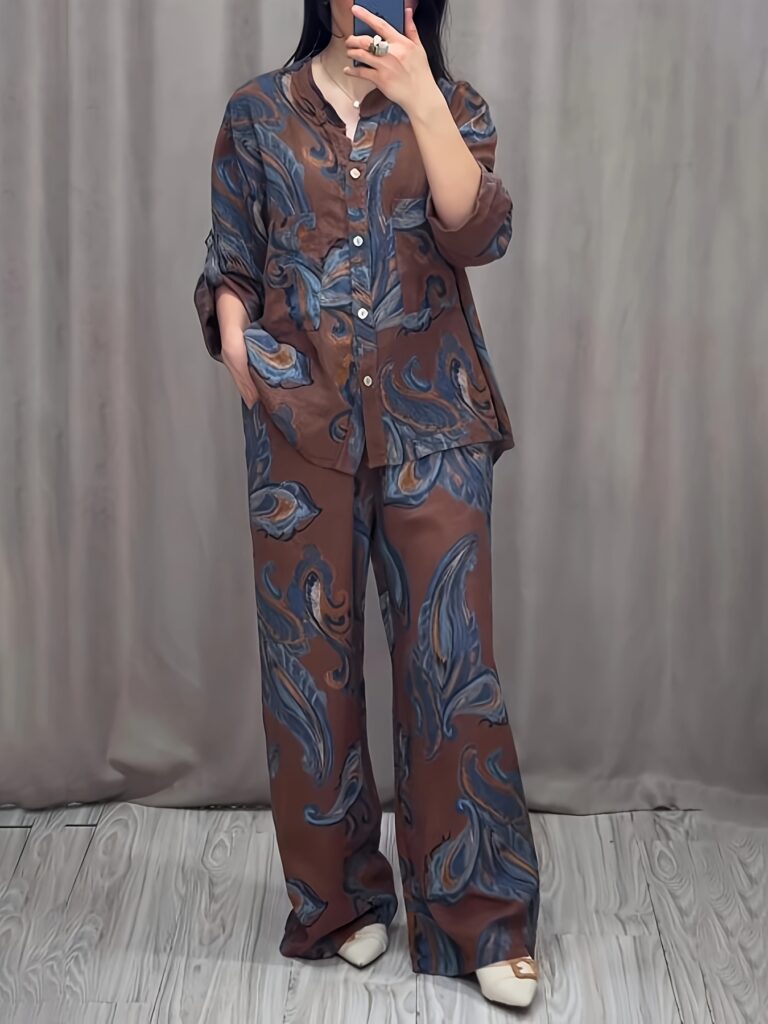 Blush Blossom Printed Pleated Set by Newness. Flattering two-piece outfit in a beautiful pleated design. Model wears a size small.