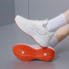 Newness Cloudwalk Womens Casual Sneakers in white showcasing breathable fabric and comfortable EVA sole Modern design for everyday style
