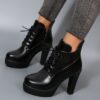 Newness Noir Chunky Heel Ankle Boots Elevate your style with these comfortable and versatile black ankle boots perfect for any occasion
