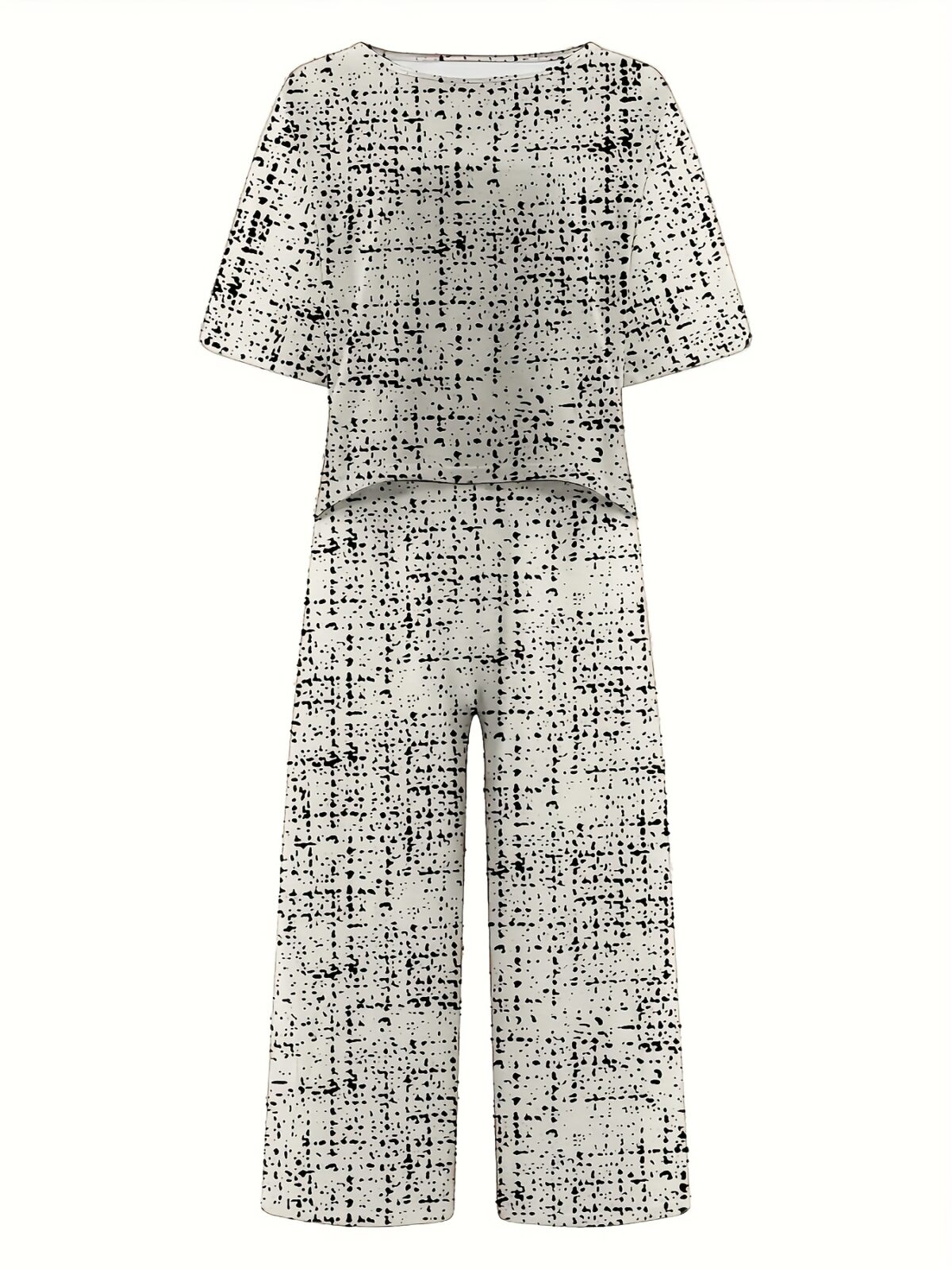 Model wearing the Newness Dubai Nights Geometric Print Set a two piece outfit with a striking geometric pattern