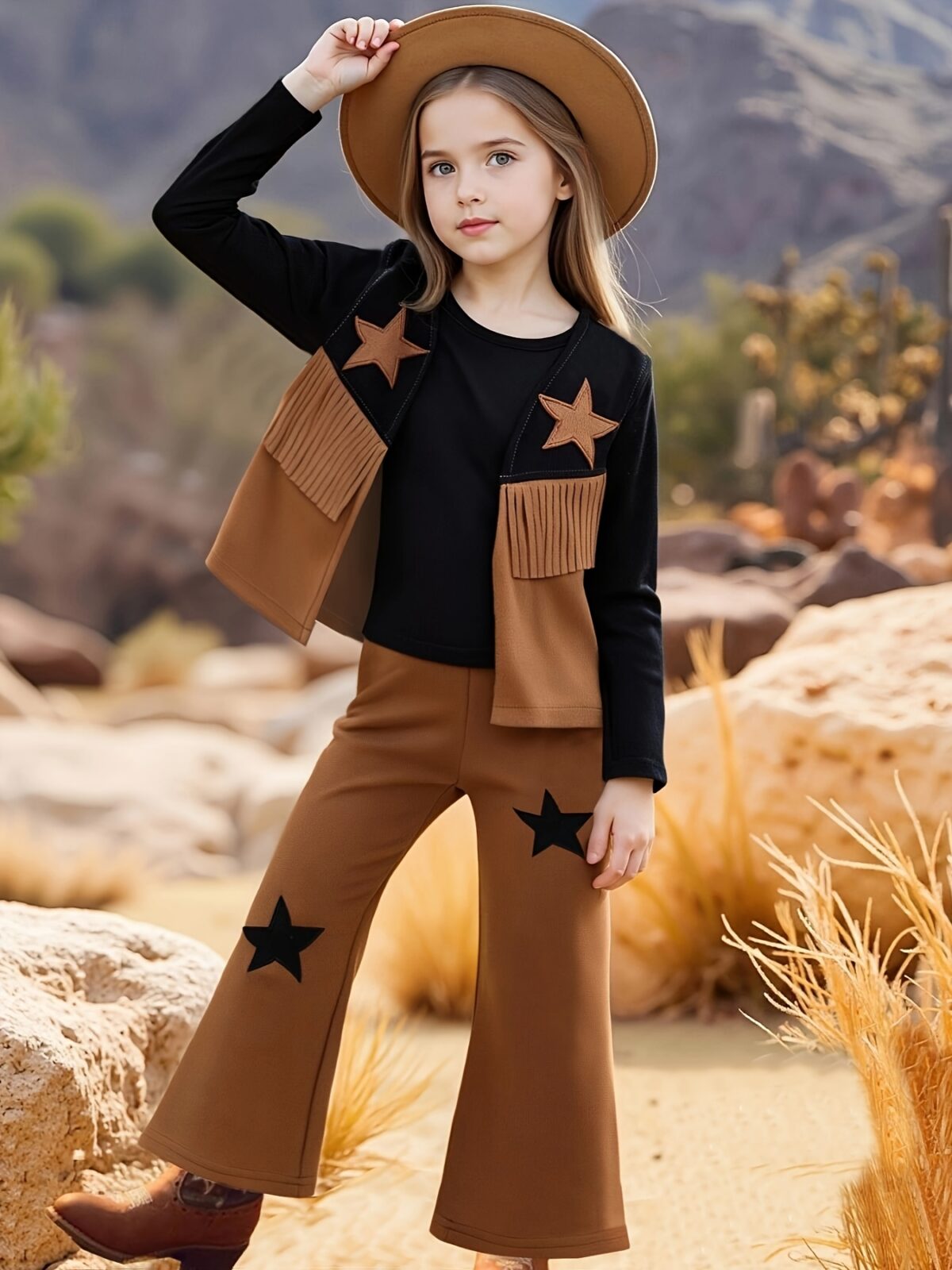 Adorable girl twirling in the Newness Starlight Dreams Girls Western Set showcasing its sparkly details and stylish western design Perfect for parties or playtime