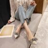 Golden stiletto heels with elegant bow featuring a comfortable insole and slip resistant sole perfect for weddings and events