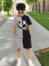 Adorable boy wearing a trendy color block set perfect for playtime school or any casual occasion The outfit features vibrant colors and a comfortable soft fabric