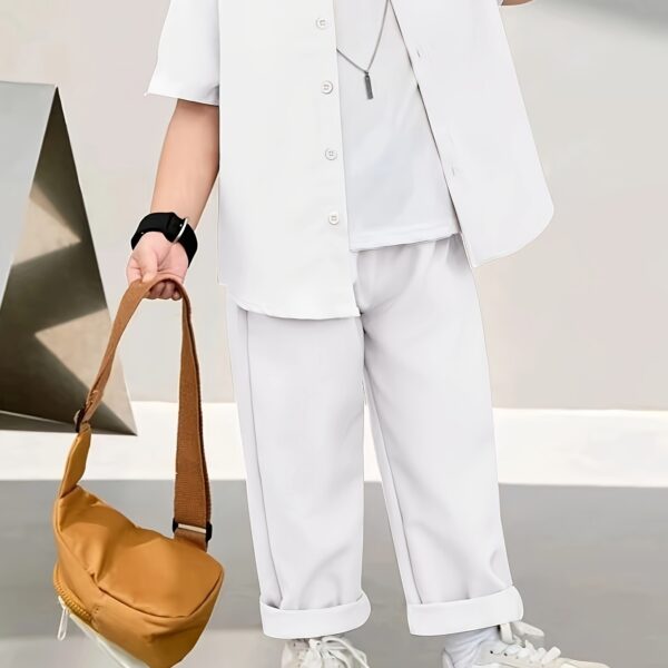 Stylish boys' solid color shirt and pants set, perfect for spring and summer. Lightweight and comfortable, ideal for warm weather.