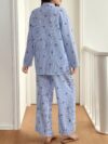 Effortless Chic The Parisian Striped Lounge Set in soft polyester A stylish two piece set perfect for relaxing at home Model wearing the matching striped top and pants
