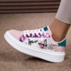 Newness Pastel Dream Butterfly Print Sneakers Chic and comfy pastel sneakers with a beautiful butterfly print perfect for spring
