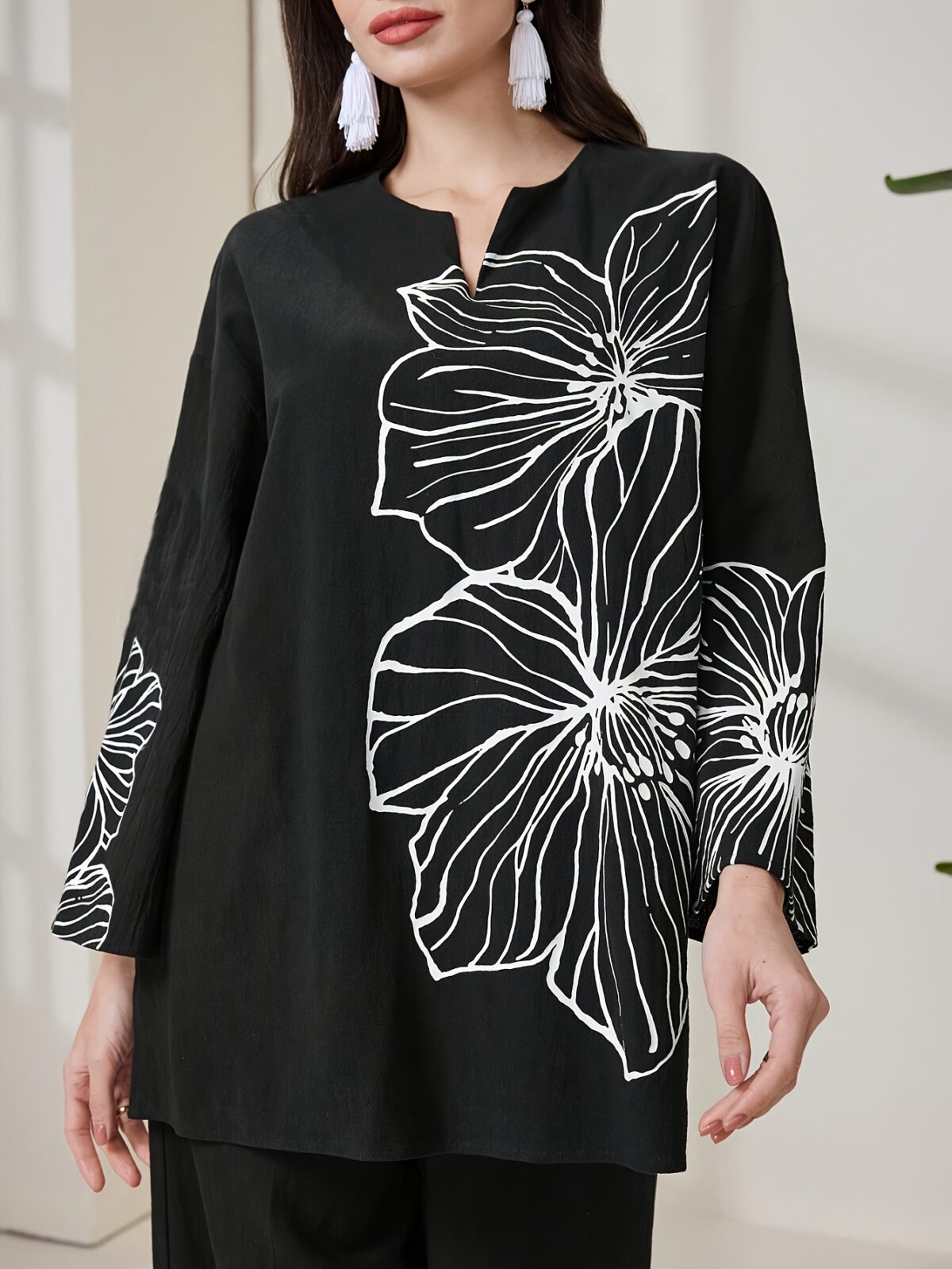 Embrace the autumn season in style with Newnesss Autumn Bloom Floral Print Set This chic two piece ensemble features a soft polyester fabric and a beautiful floral print perfect for effortless autumn fashion