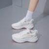 Newness Cloudwalk Womens Casual Sneakers in white showcasing breathable fabric and comfortable EVA sole Modern design for everyday style
