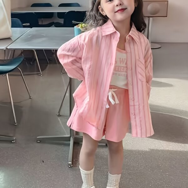 Adorable girl wearing Newness Riviera Chic summer outfit a stylish and breathable dress perfect for sunny days